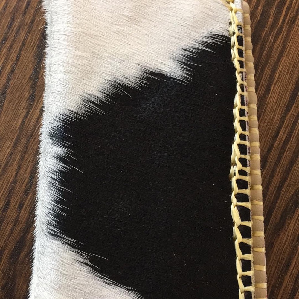 Cow hair on leather wallet